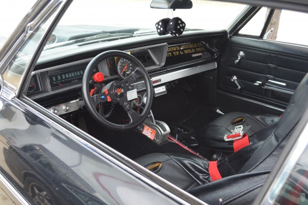 inside view of a modified 1966 chevy impala coupe