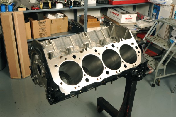 bare big block chevy v8 engine block on a stand