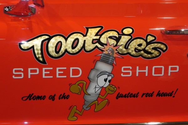 tootsie's speed shop graphic on side of a hot rod