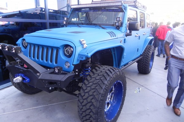 custom blue jeep wrangler on display at SEMA 2014 Automotive trade show