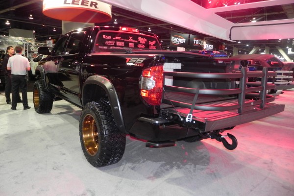 truck with bed extender rack on display at SEMA 2014 Automotive trade show