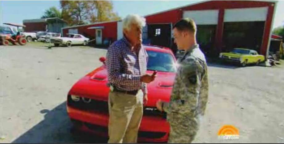 jay leno giving a dodge challenger to a wounded veteran