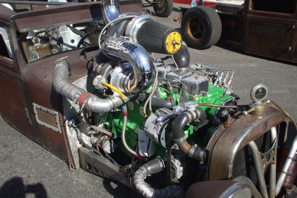engine of a turbocharged rat rod on display at 2014 SEMA Trade Show