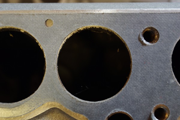 close up of a port on a manifold gasket