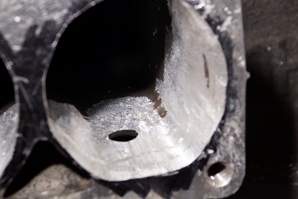close up of port machining work done on an intake