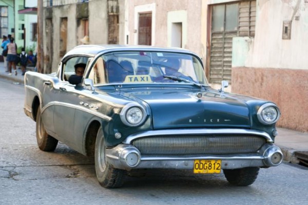 old cars driven on streets of cuba