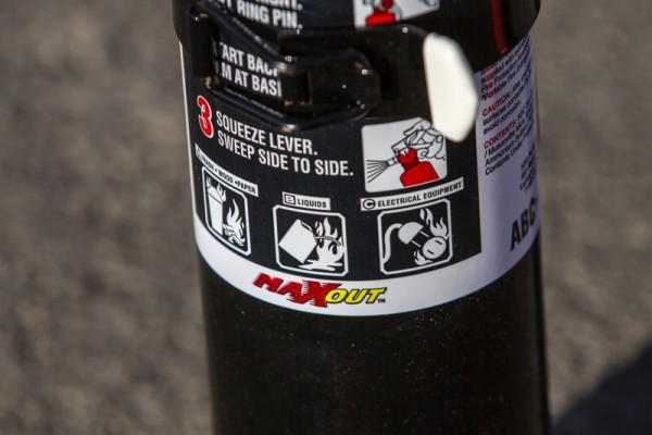 close up an A,B and C label on a fire extinguisher