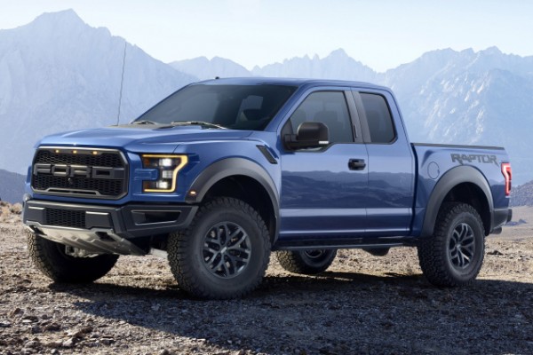 2017 ford f-150 raptor atop mountain trail