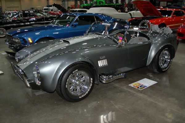 shelby cobra 427 on display in indoor car show