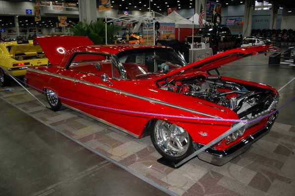 early 1960s era red chevy impala custom coupe