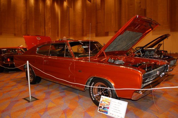 1966 dodge charger coupe on display in indoor car show