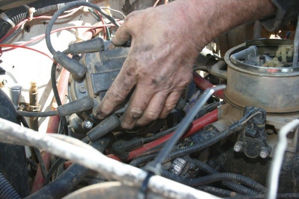 removing cap from an engine distributor