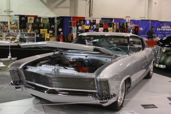 buick riviera custom coupe on display at car show