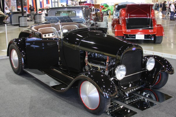 lowered ford roadster coupe on display at car show