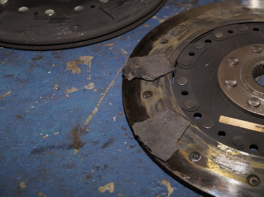 a broken bad clutch pulled from a ford mustang foxbody