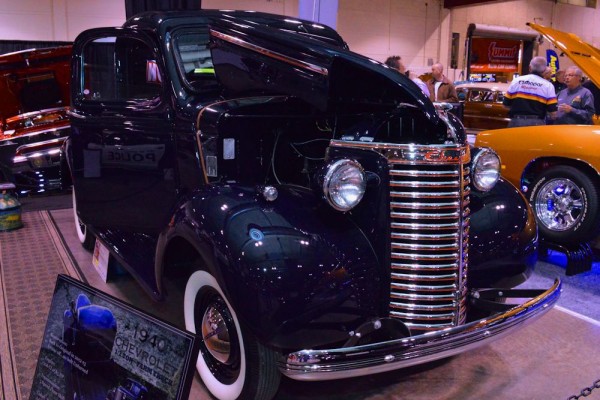 1940 chevy pickup truck on display at indoor car show
