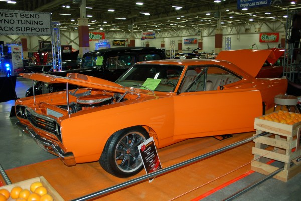 plymouth road runner custom orange coupe at vintage car show