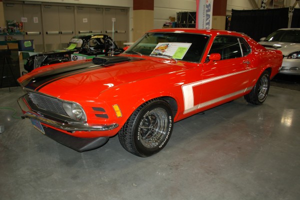 vintage ford mustang with shaker hood at classic car show