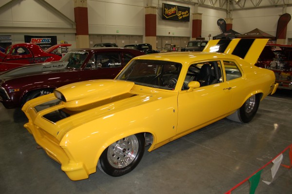 yellow pro stock style chevy nova drag car