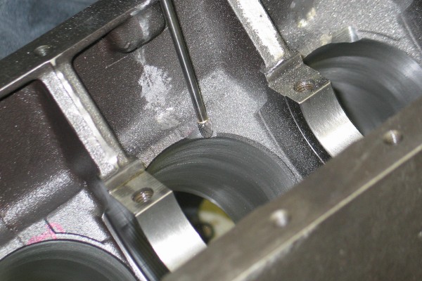 notching cylinder bores for connecting rod clearance