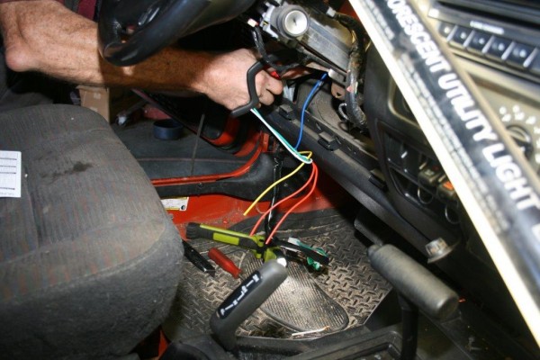 remote starter wiring harness being installed
