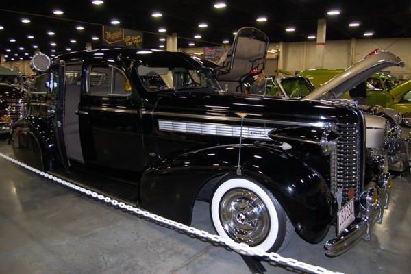 vintage prewar luxury sedan limousine at indoor car show