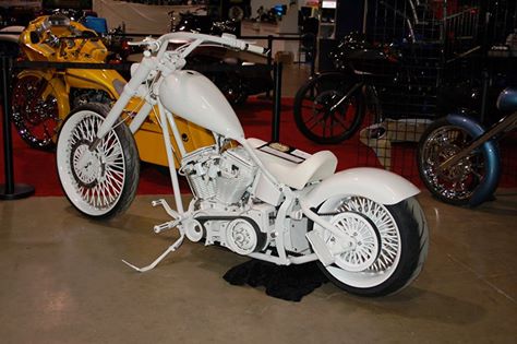 all white custom v twin bobber motorcycle
