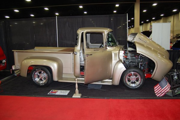 customized hot rod pickup truck at indoor car show