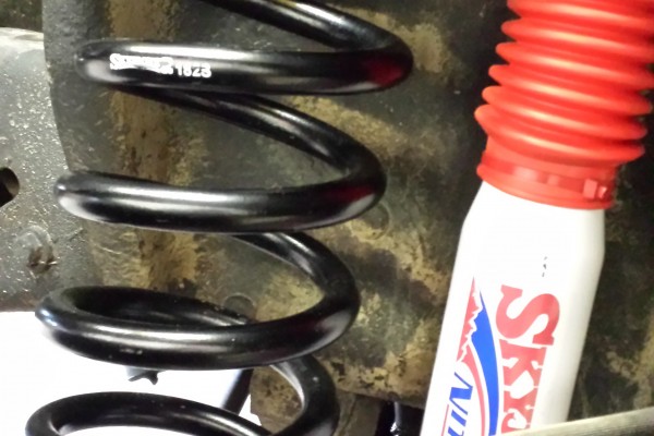 coil spring and shock on an old ford bronco