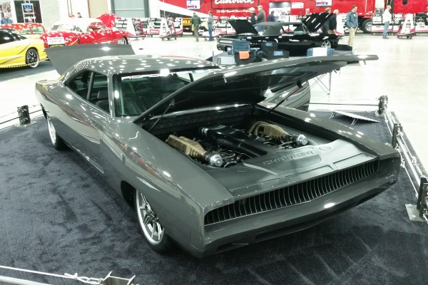 customized second gen dodge charger on display at indoor car show