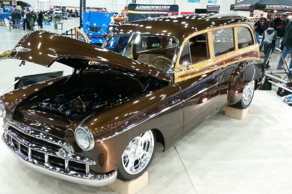 vintage woody wagon show car on display at indoor car show