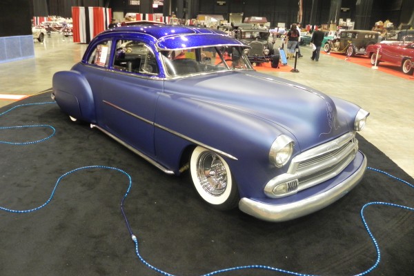 vintage postwar chevy coupe hot rod with lake pipes