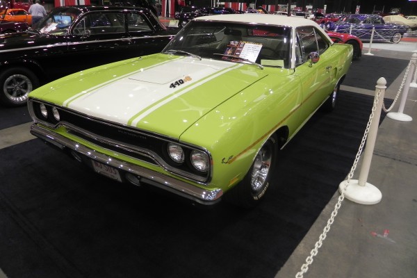 plymouth roadrunner 440 on display at indoor car show