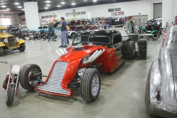 lowered custom hotrod truck on display at indoor car show