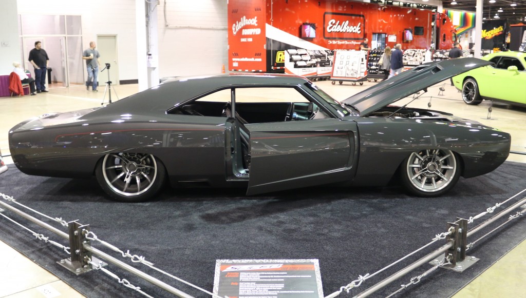 customized dodge charger at a car show