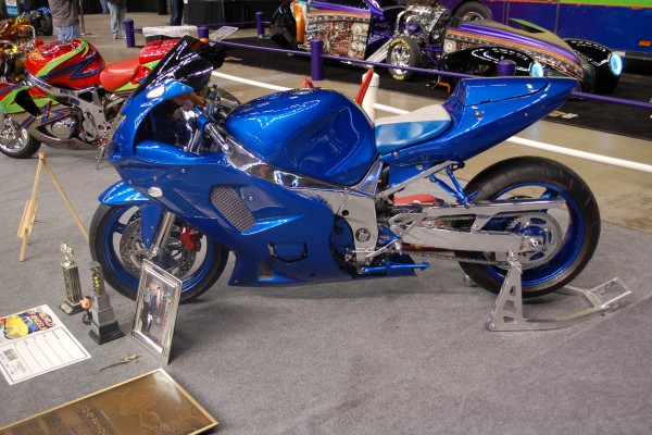 blue Customized sportbike at a car show