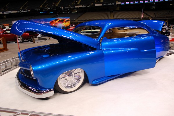blue custom coupe show car at car show
