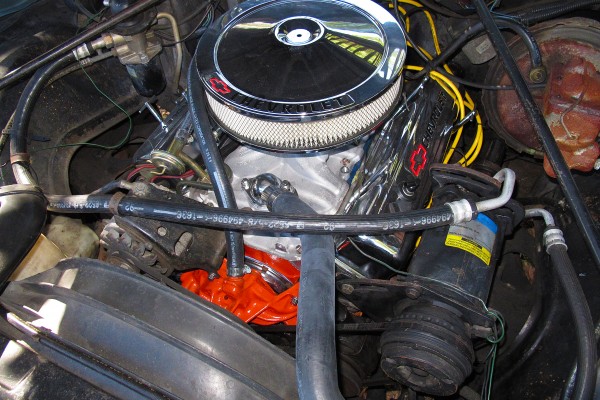 small block chevy v8 engine in an old car
