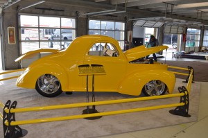 yellow 1941 hot rod willys coupe on display