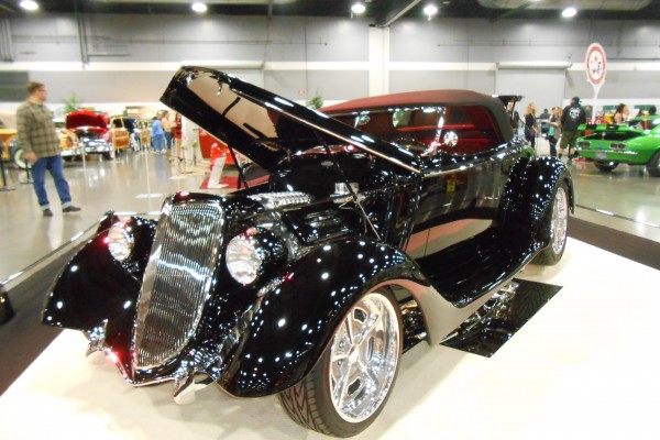customized show car displayed at indoor car show