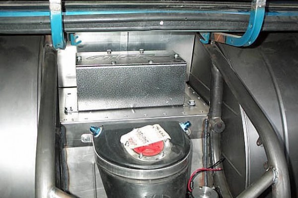 fuel cell and ballast box between wheel tubs on a drag race car