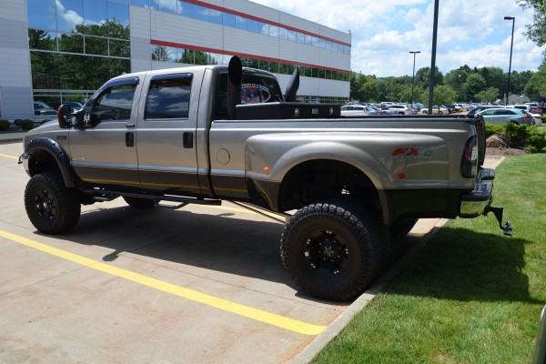 Ford F350 lifted truck, driver side view