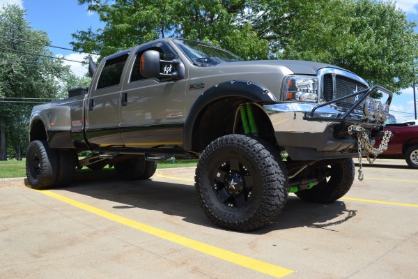 Ford F350 lifted truck, front passenger side quarter