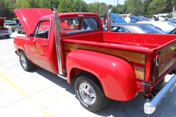 dodge lil red express truck at a car show