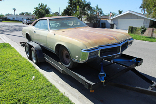 1969 buick riviera project on a car trailer