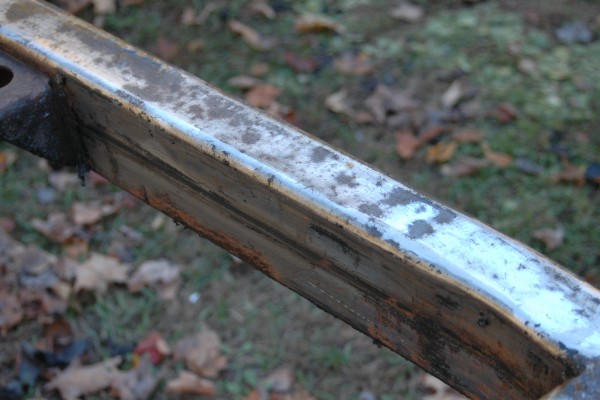 rust and pitting on a jeep frame