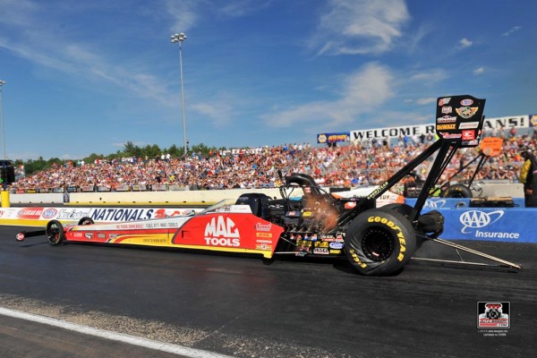 nhra top fuel dragster launching at a race in 2015