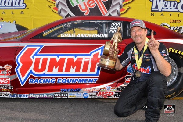 greg anderson poses with nhra wally trophy after winning pro stock race in 2015