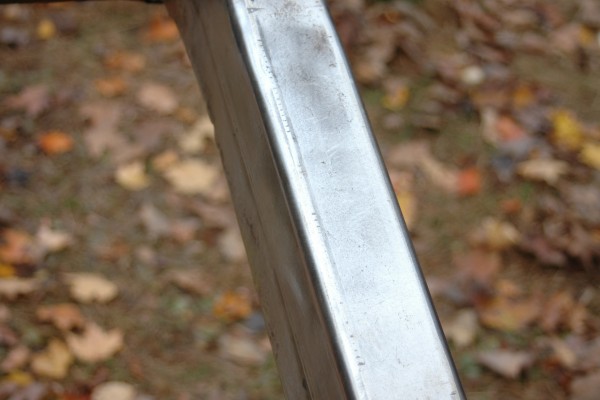 bare metal exposed on a vehicle frame prior to painting