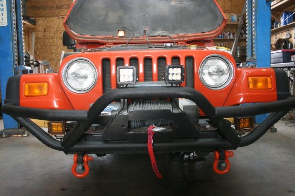off-roading front bumper mounted on a jeep wrangler TJ
